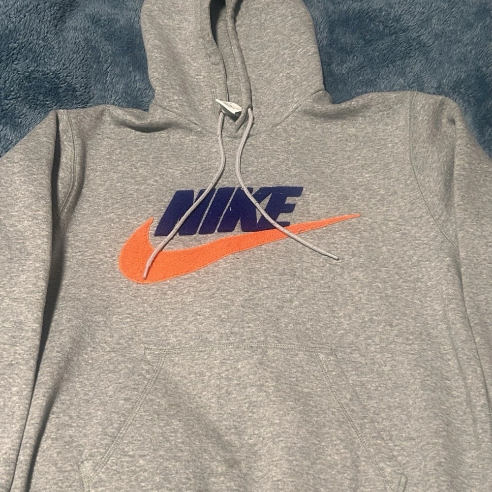 Nike Heather Gray Hoodie with Vibrant Orange and Deep Blue Logo